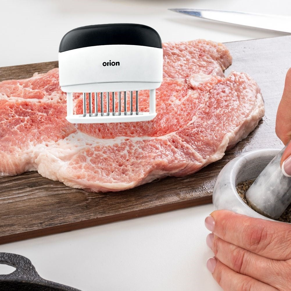 Meat tenderizer with 20 stainless steel blades