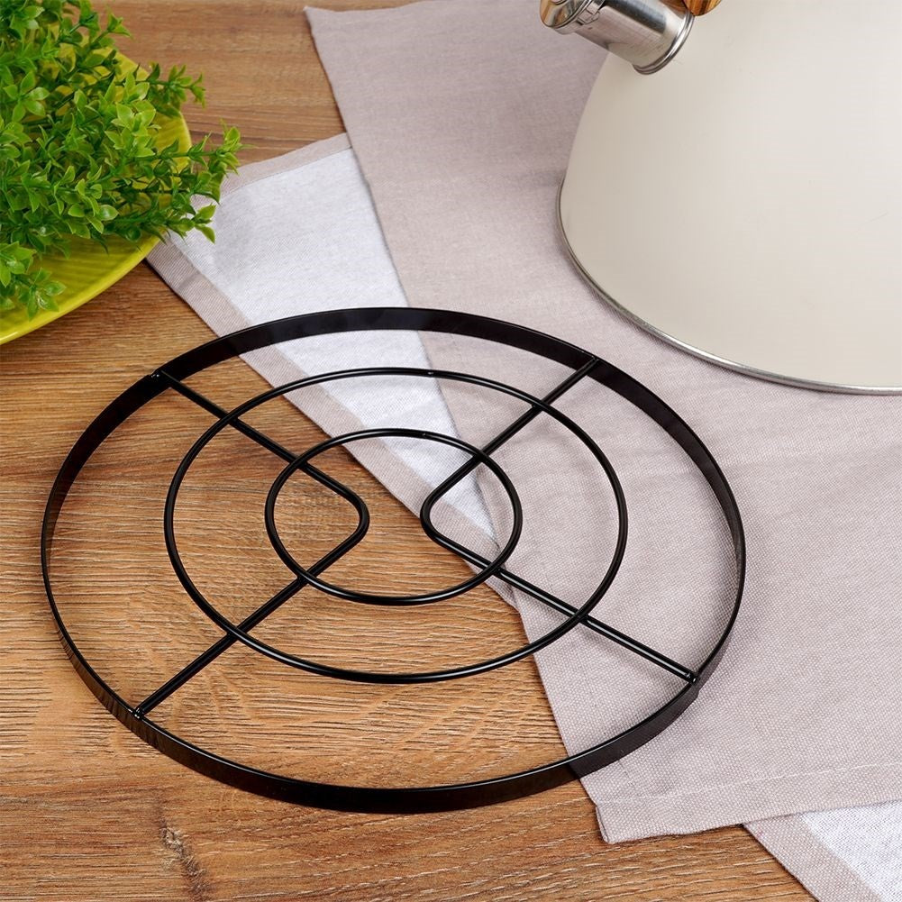 Metal coasters protect tables from hot pots and pans