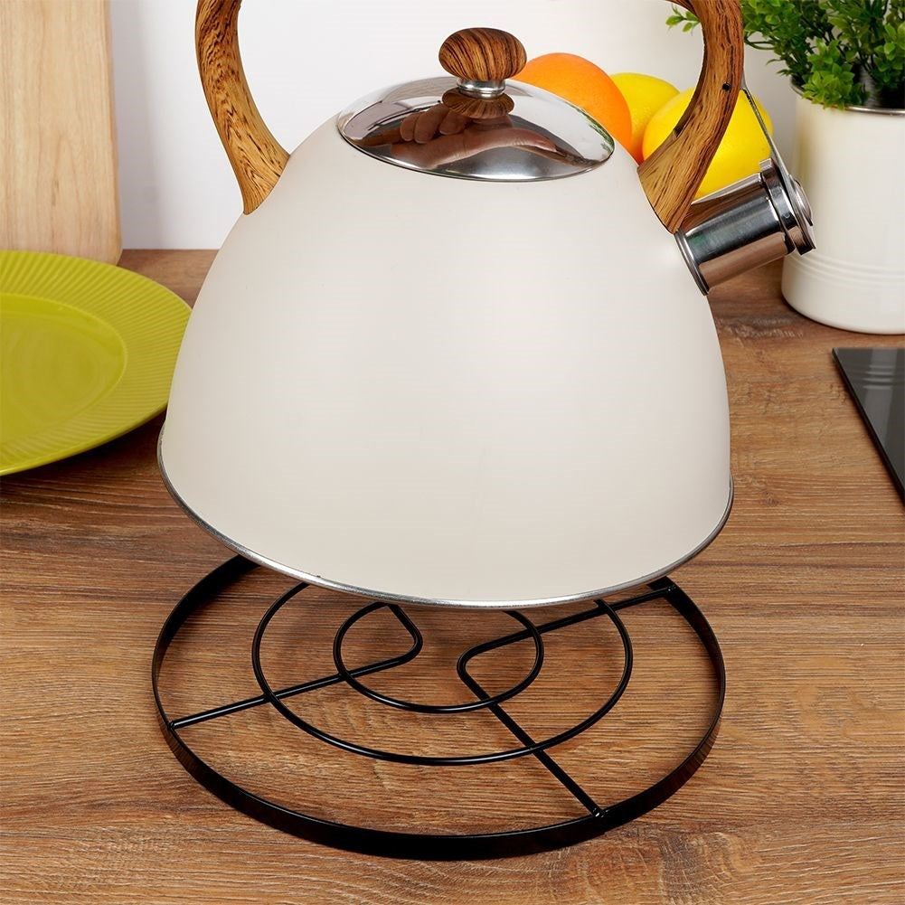 Metal coasters protect tables from hot pots and pans