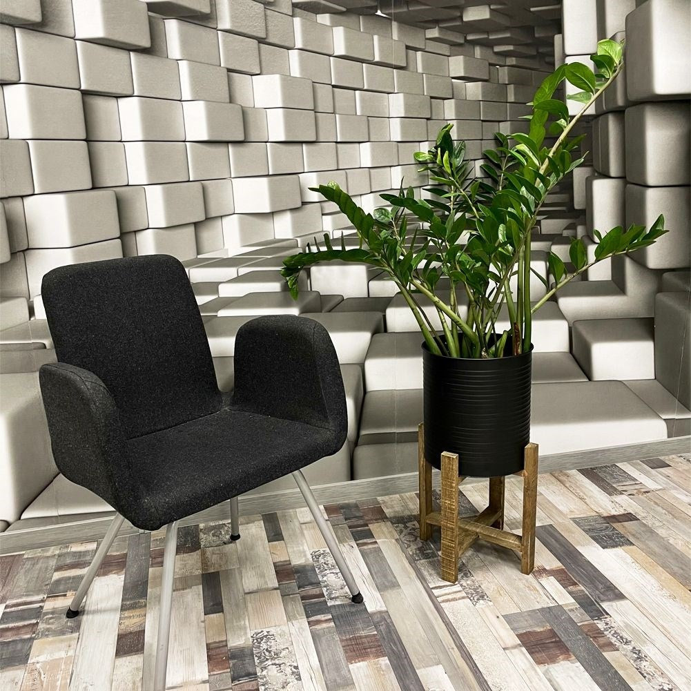 Metal flower pot on a wooden stand for modern interior design