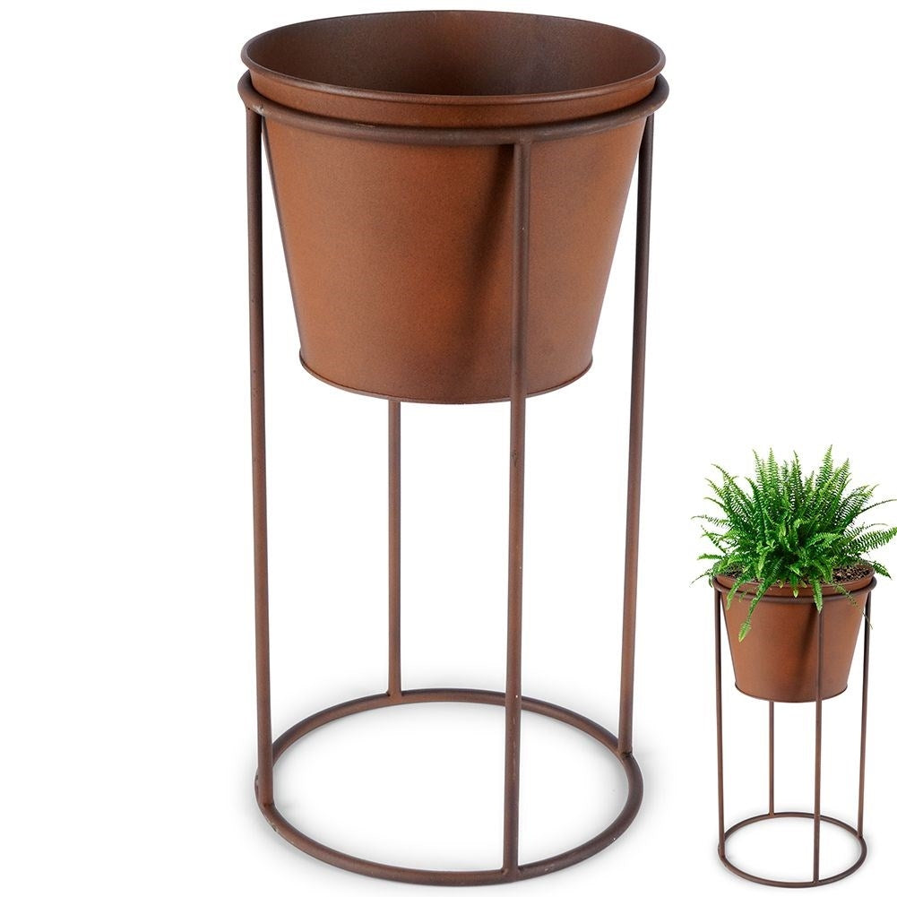 Metal flower pot on stand with rust effect