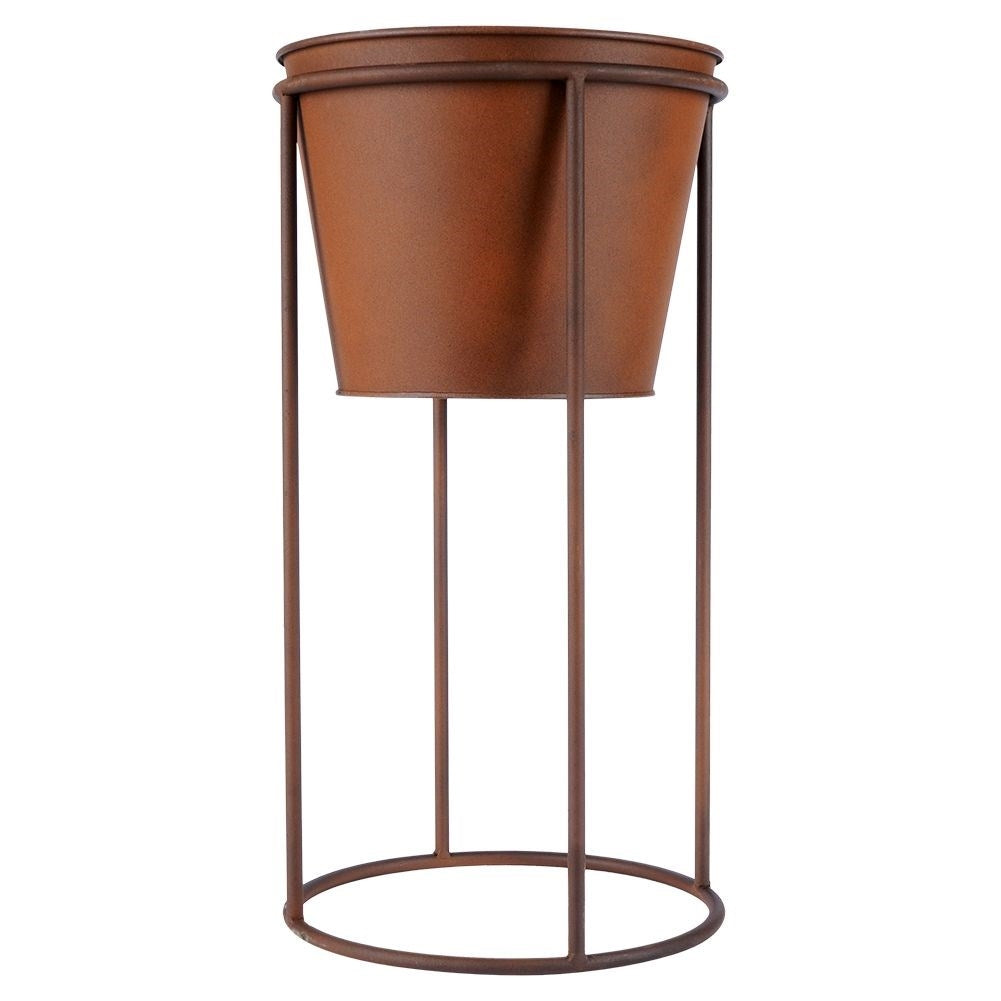 Metal flower pot on stand with rust effect