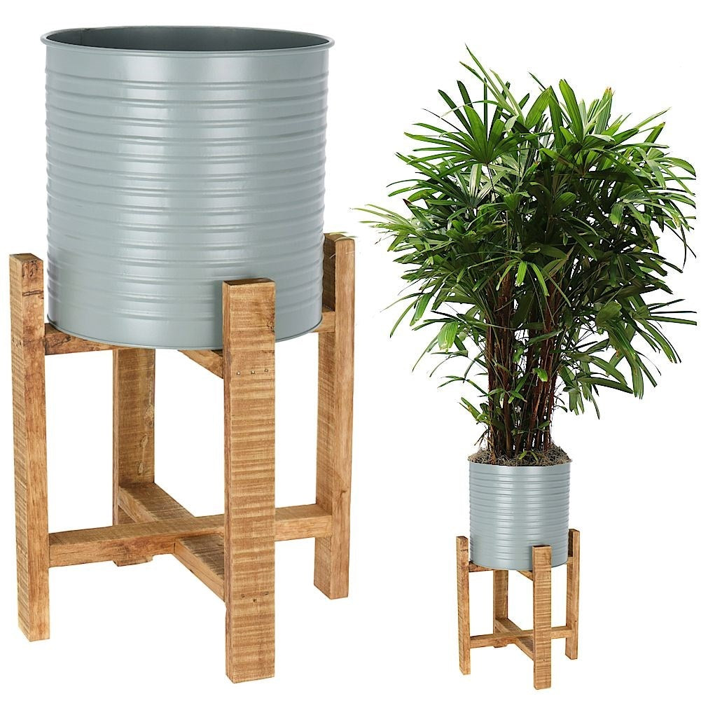 Metal flower pot with wooden stand for modern interior design
