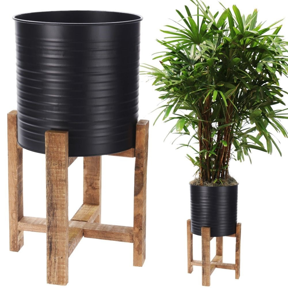 Metal flower pot with wooden stand for modern interior design
