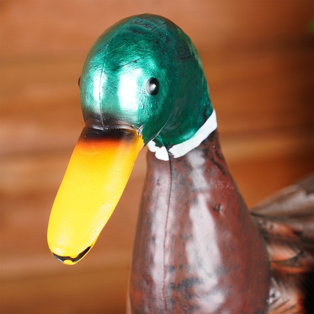 Metal garden duck with vibrant colors for outdoor use