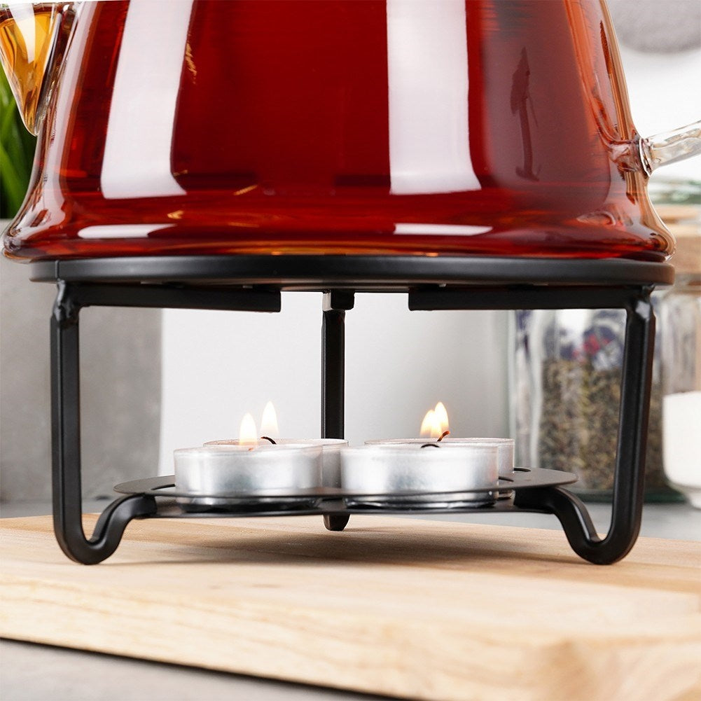 Metal heater for teapots and fondue