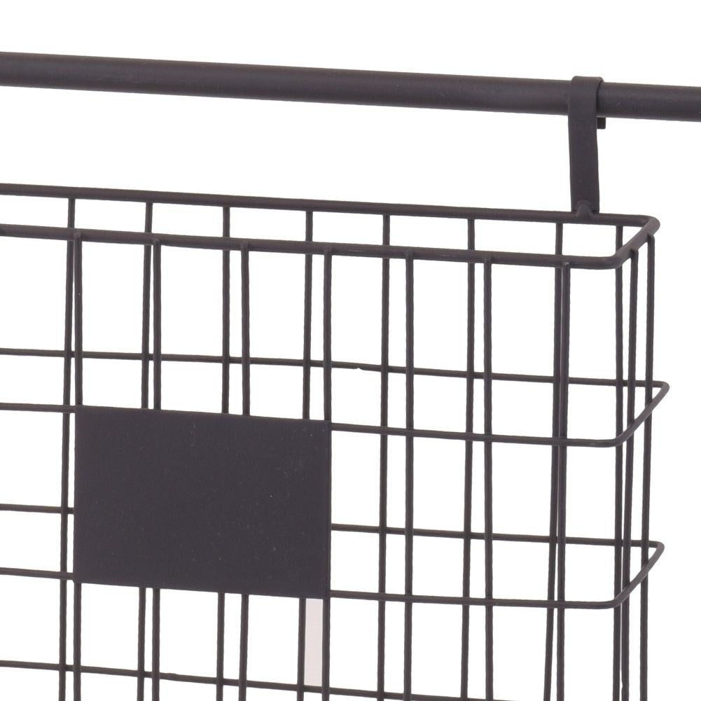 Metal ladder with baskets for newspapers and small items