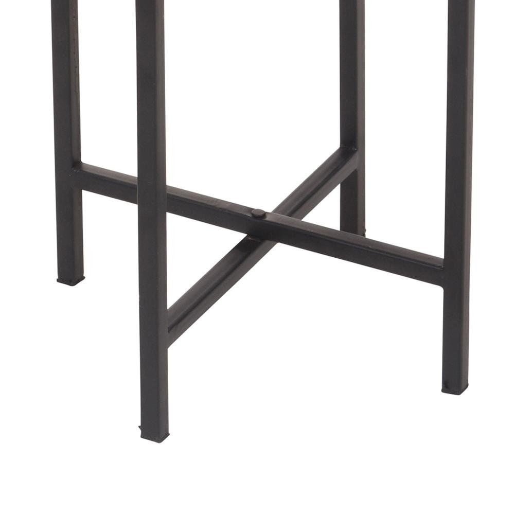 Metal pot on stand in black and gold color