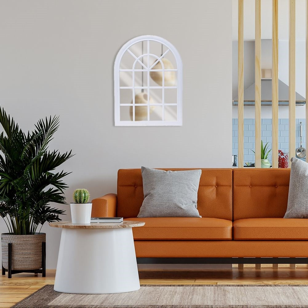 Mirror in white frame as a window, retro style, eye-catching decor.
