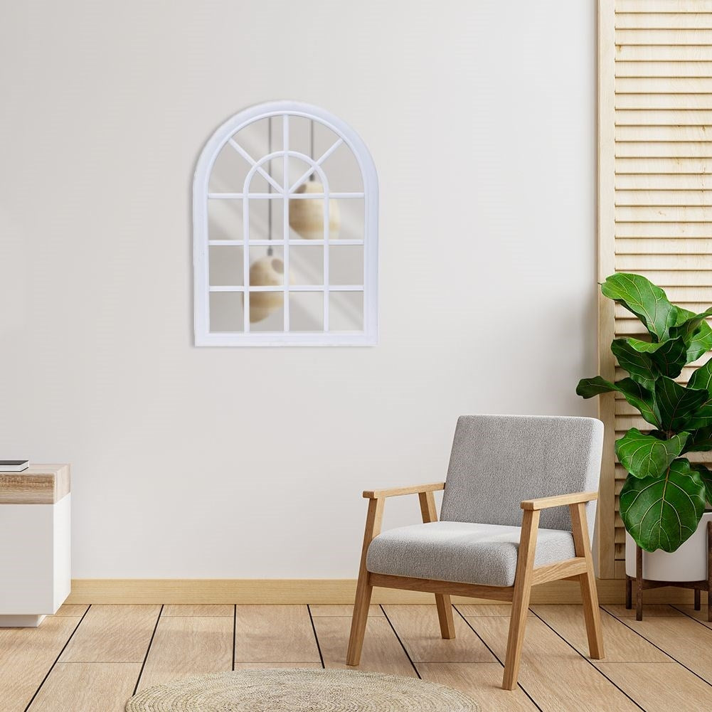 Mirror in white frame as a window, retro style, eye-catching decor.