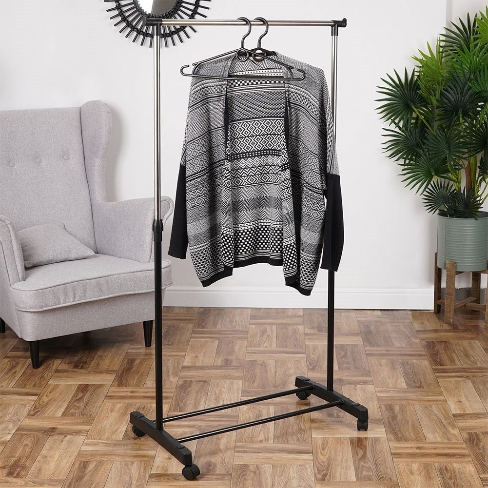 Mobile coat hanger with wheels and shoe shelf