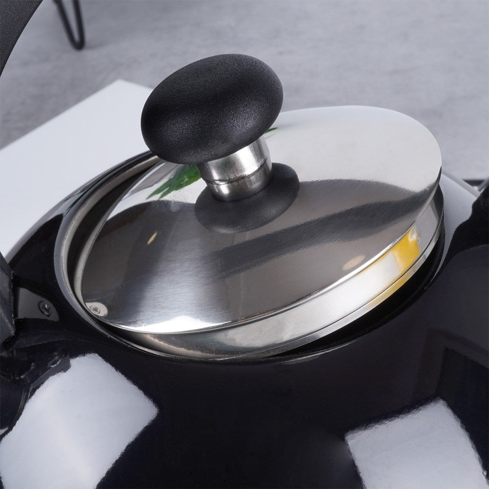 Modern kettle with tiltable whistle in stainless steel