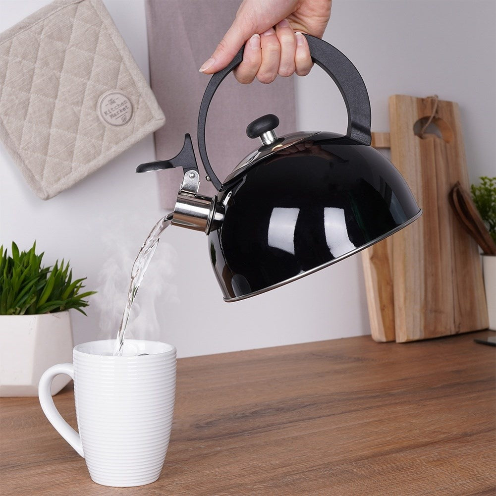 Modern kettle with tiltable whistle in stainless steel