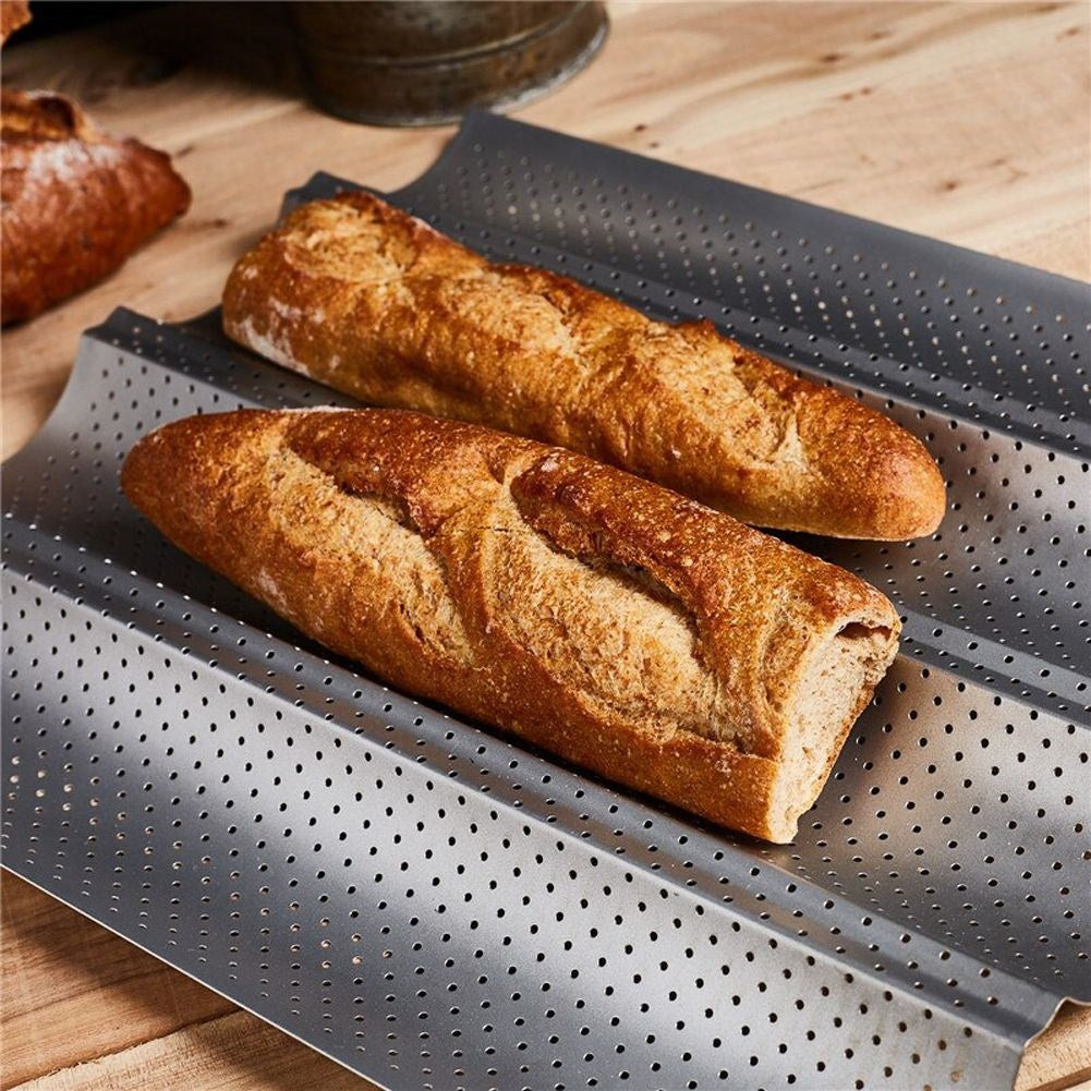 Mold for crispy, golden brown baguettes with non-stick surface