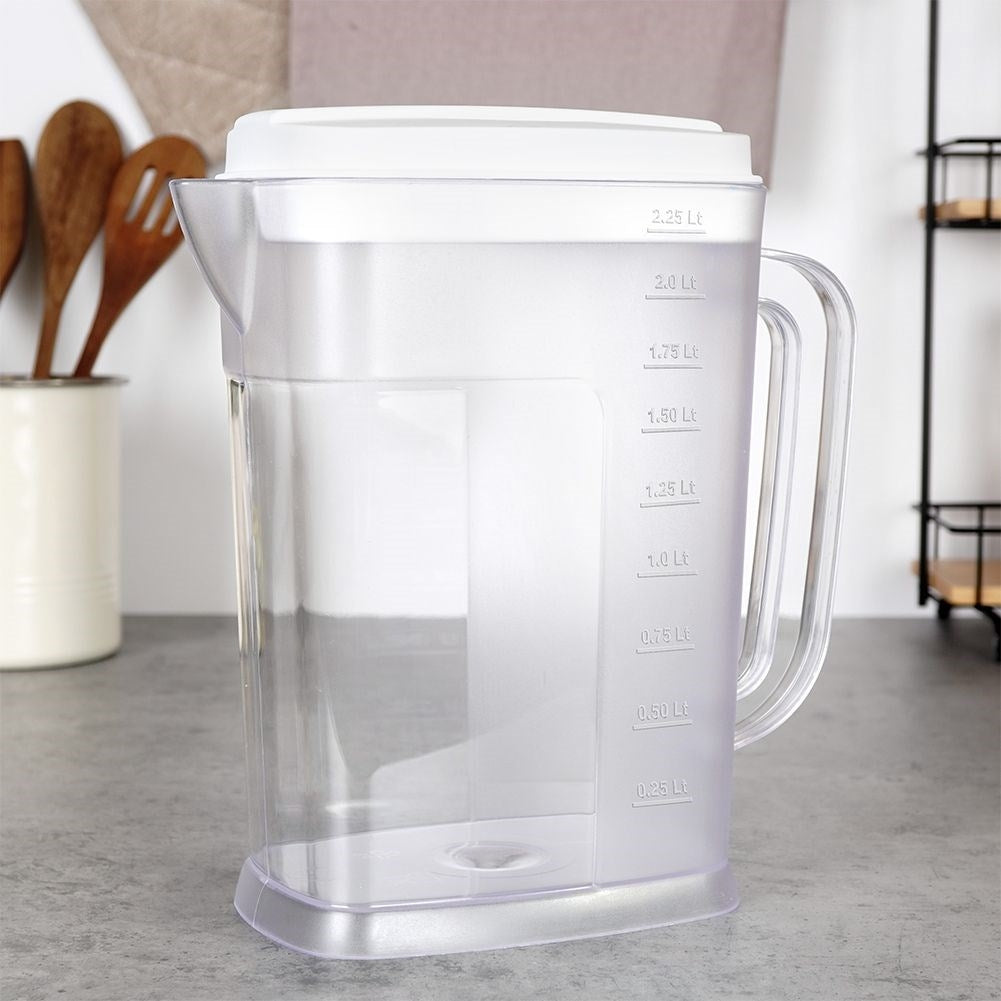 Multifunctional plastic jug with measuring scale and refrigerator-friendly design