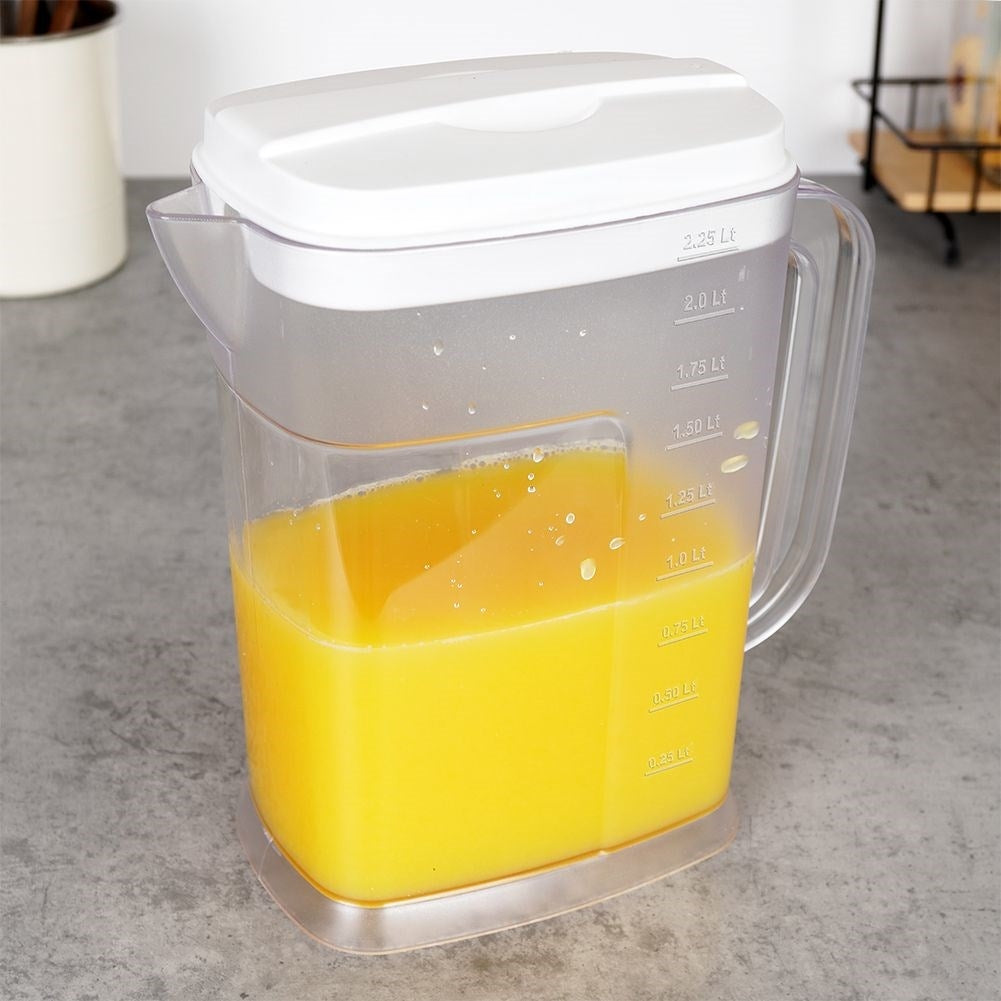Multifunctional plastic jug with measuring scale and refrigerator-friendly design