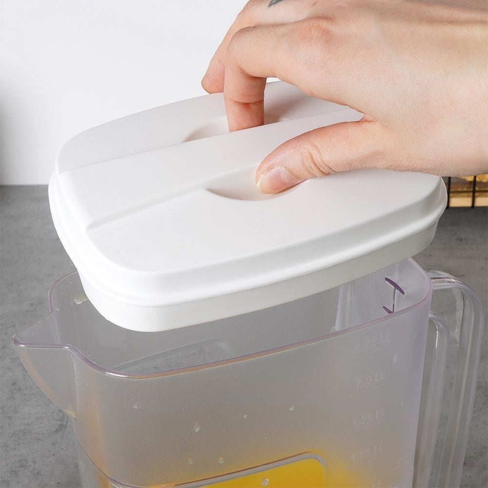 Multifunctional plastic jug with measuring scale and refrigerator-friendly design