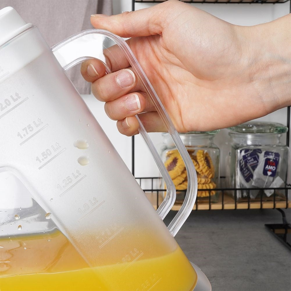 Multifunctional plastic jug with measuring scale and refrigerator-friendly design