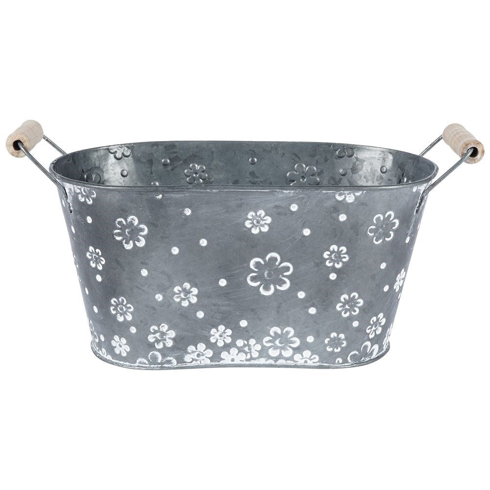 Oblong galvanized pot with handle and white flowers