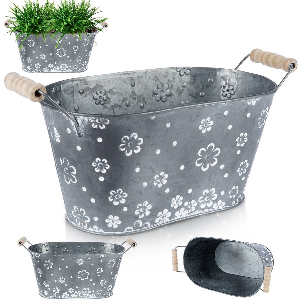 Oblong galvanized pot with handle and white flowers