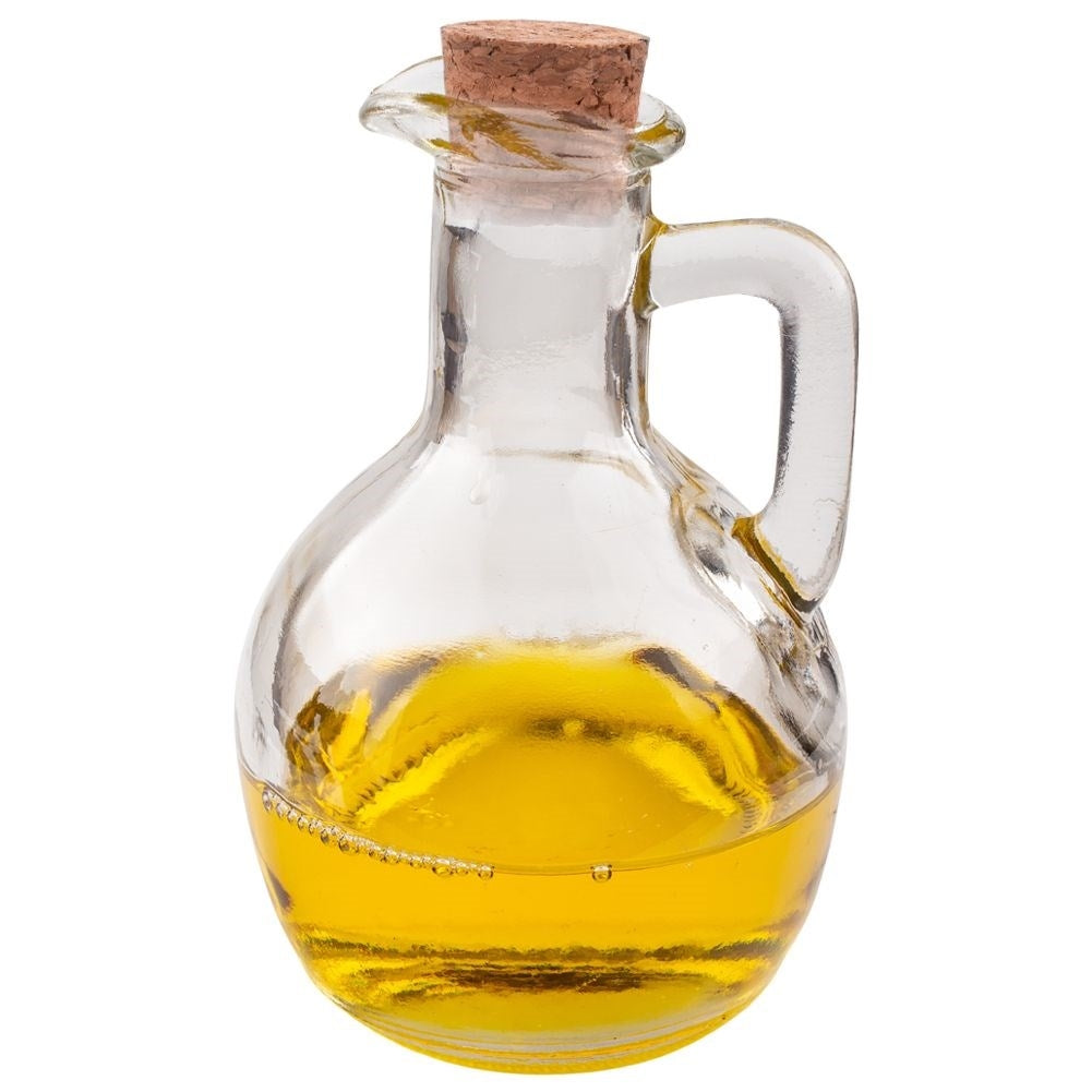 Oil bottle for serving with garlic, herbs and chilli