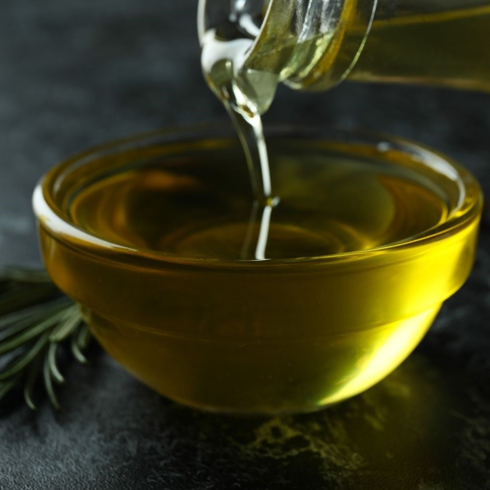 Oil bottle for serving with garlic, herbs and chilli