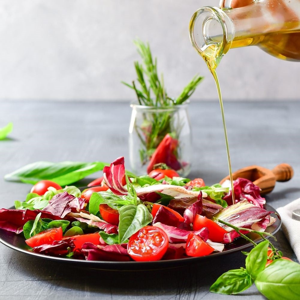 Oil bottle for serving with garlic, herbs and chilli