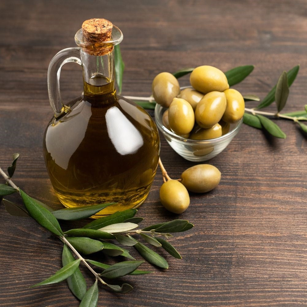 Oil bottle for serving with garlic, herbs and chilli