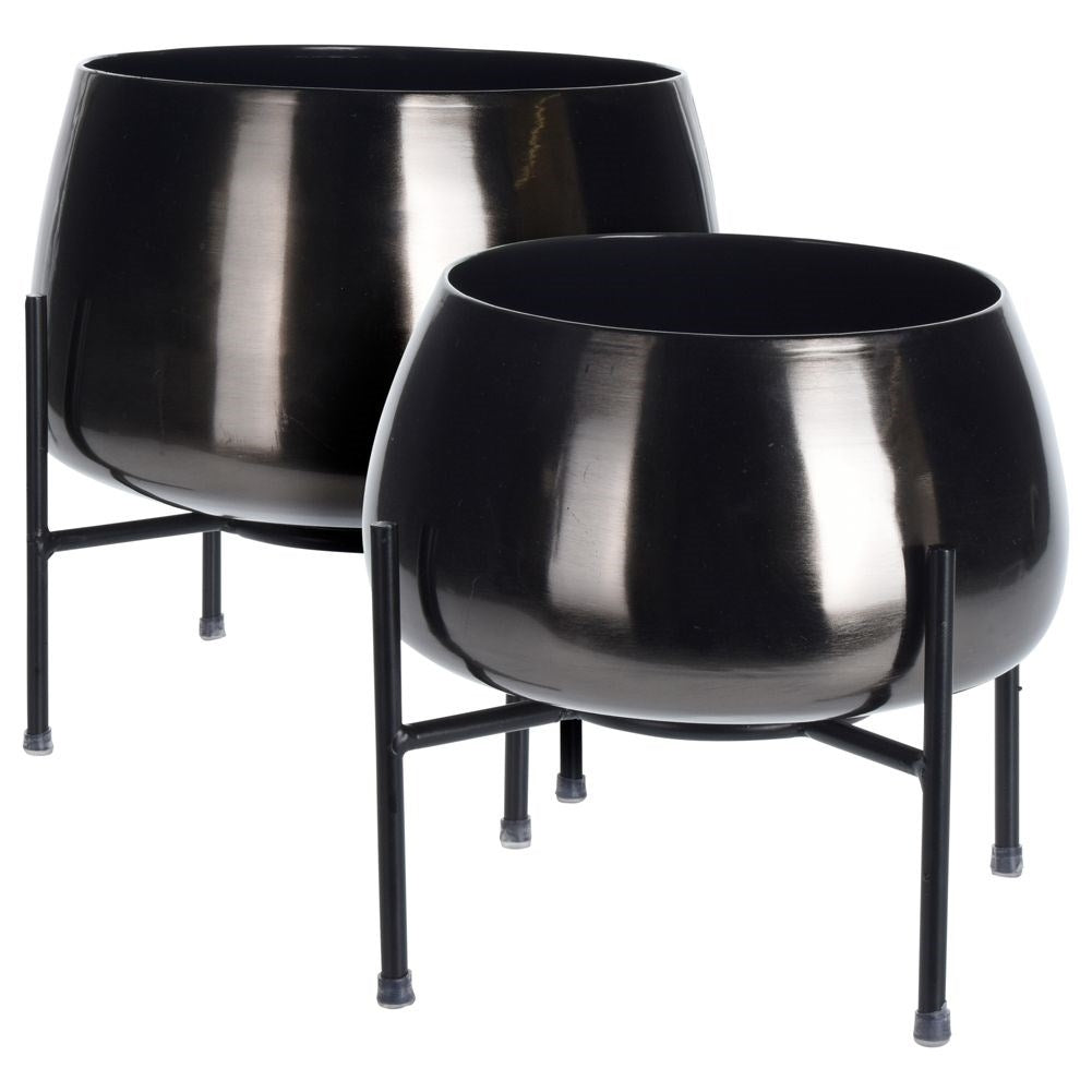 Original metal pot on stand. Stylish and elegant.