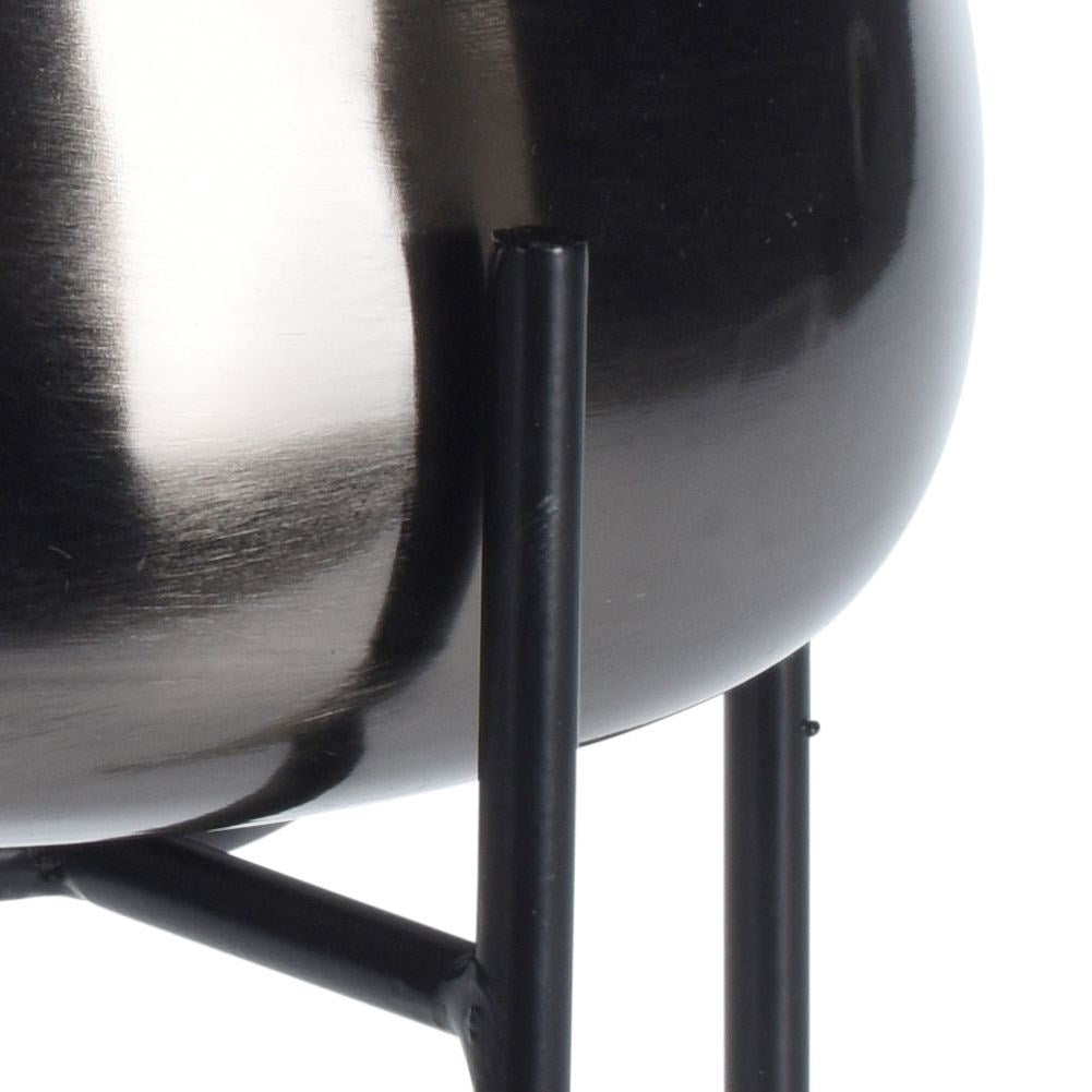 Original metal pot on stand. Stylish and elegant.