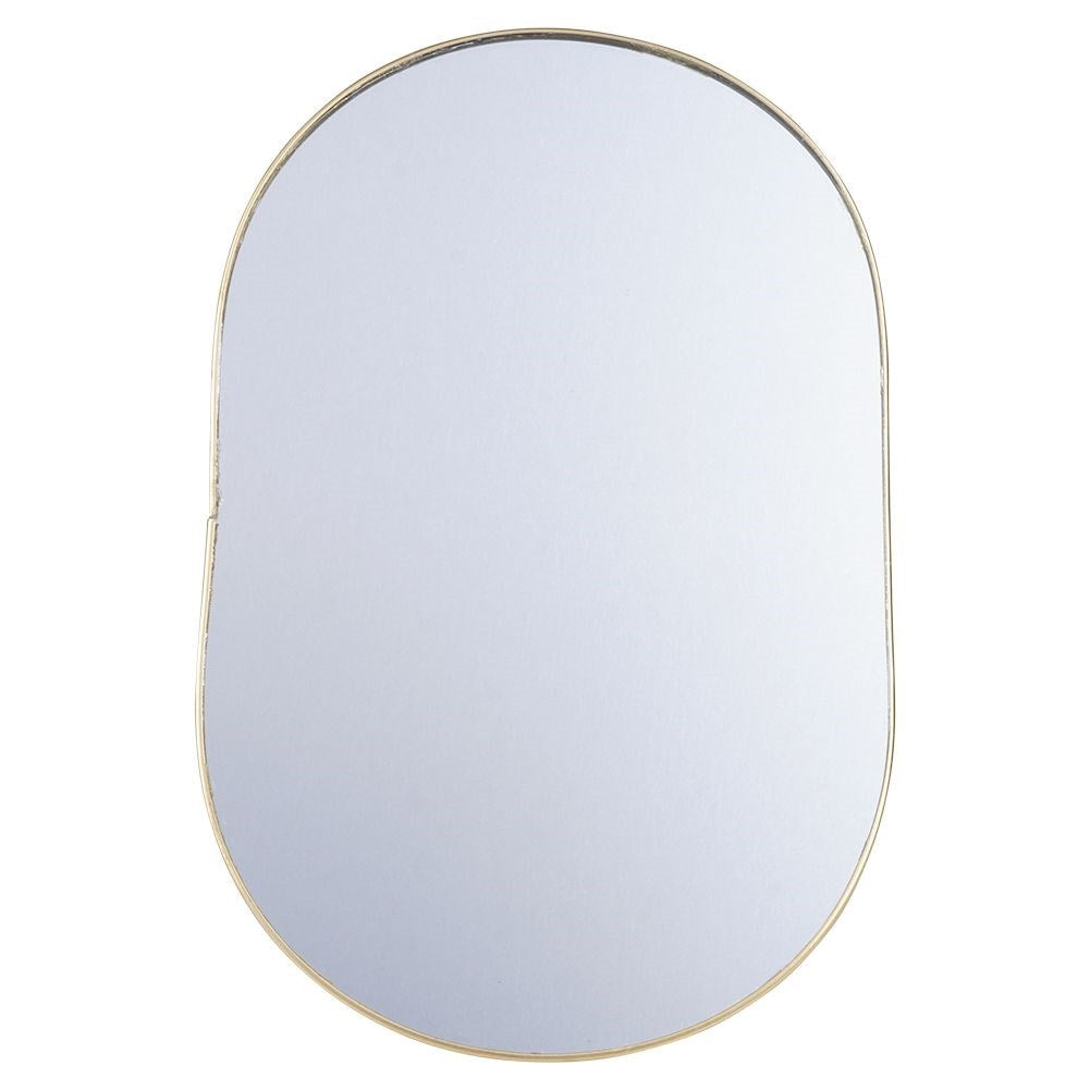 Oval cosmetic mirror on stand in luxurious gold color