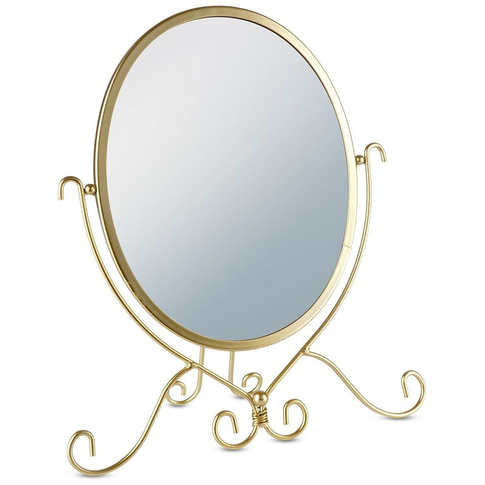 Oval make-up mirror on stand in luxurious gold color