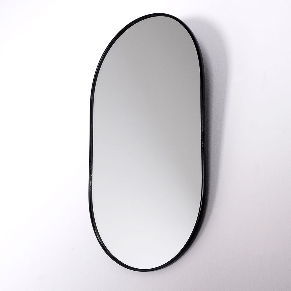 Oval make-up mirror with sturdy metal base and frame