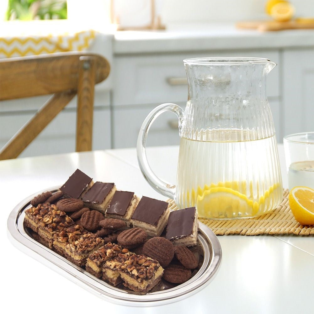 Oval serving tray for sandwiches, snacks and cakes