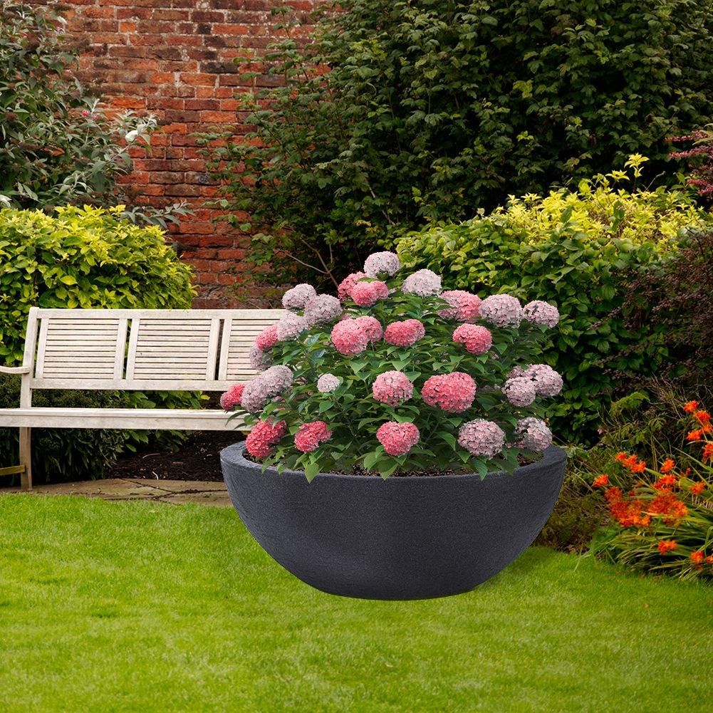 Oval weatherproof plastic pot imitating stone for outdoor use