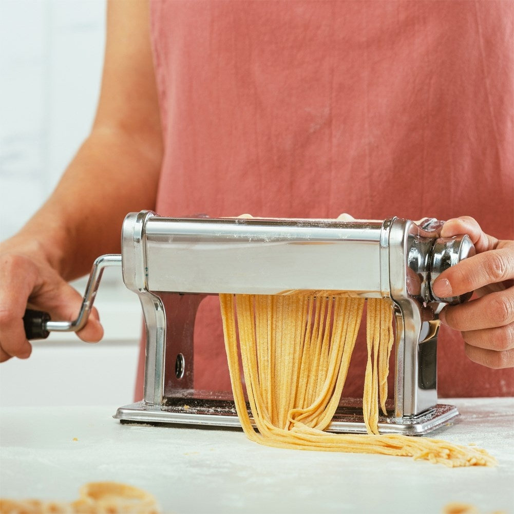 Pasta machine for rolling and cutting homemade pasta