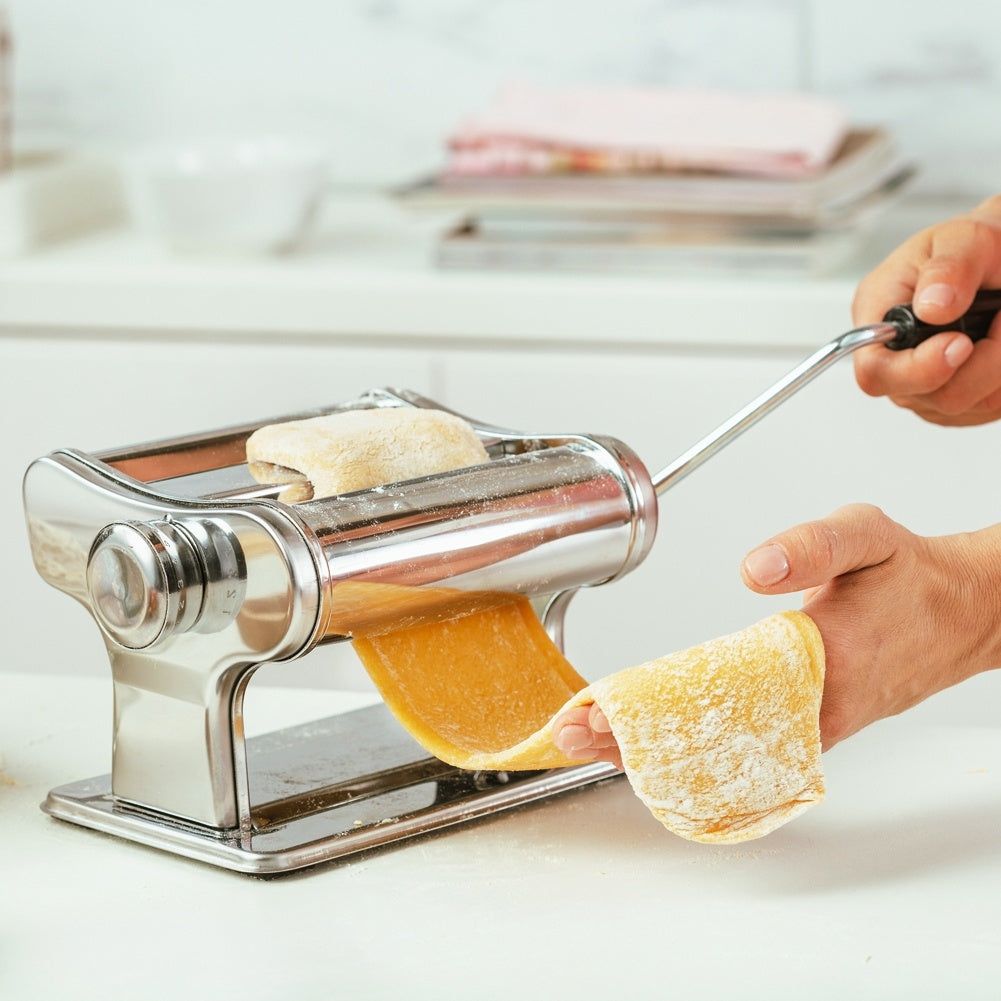 Pasta machine for rolling and cutting homemade pasta