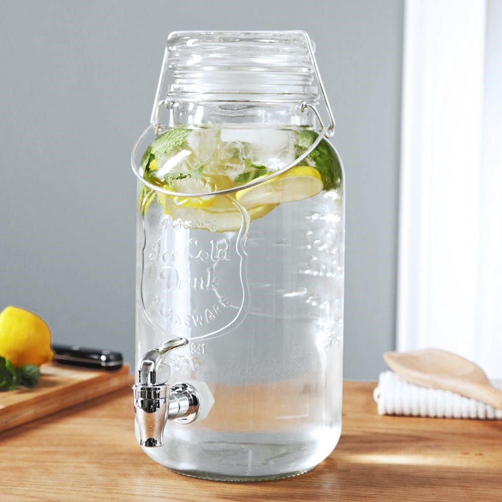Perfect beverage container with faucet for lemonade and ice