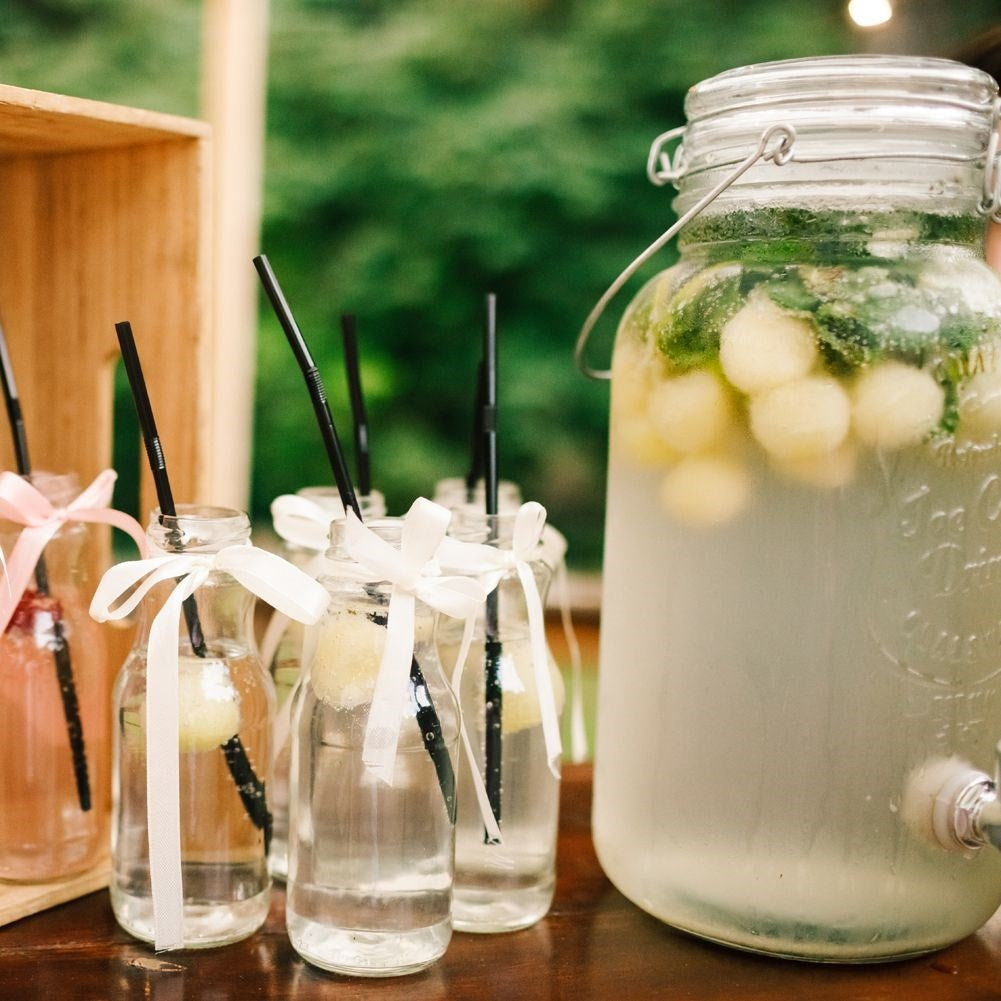 Perfect beverage container with faucet for lemonade and ice