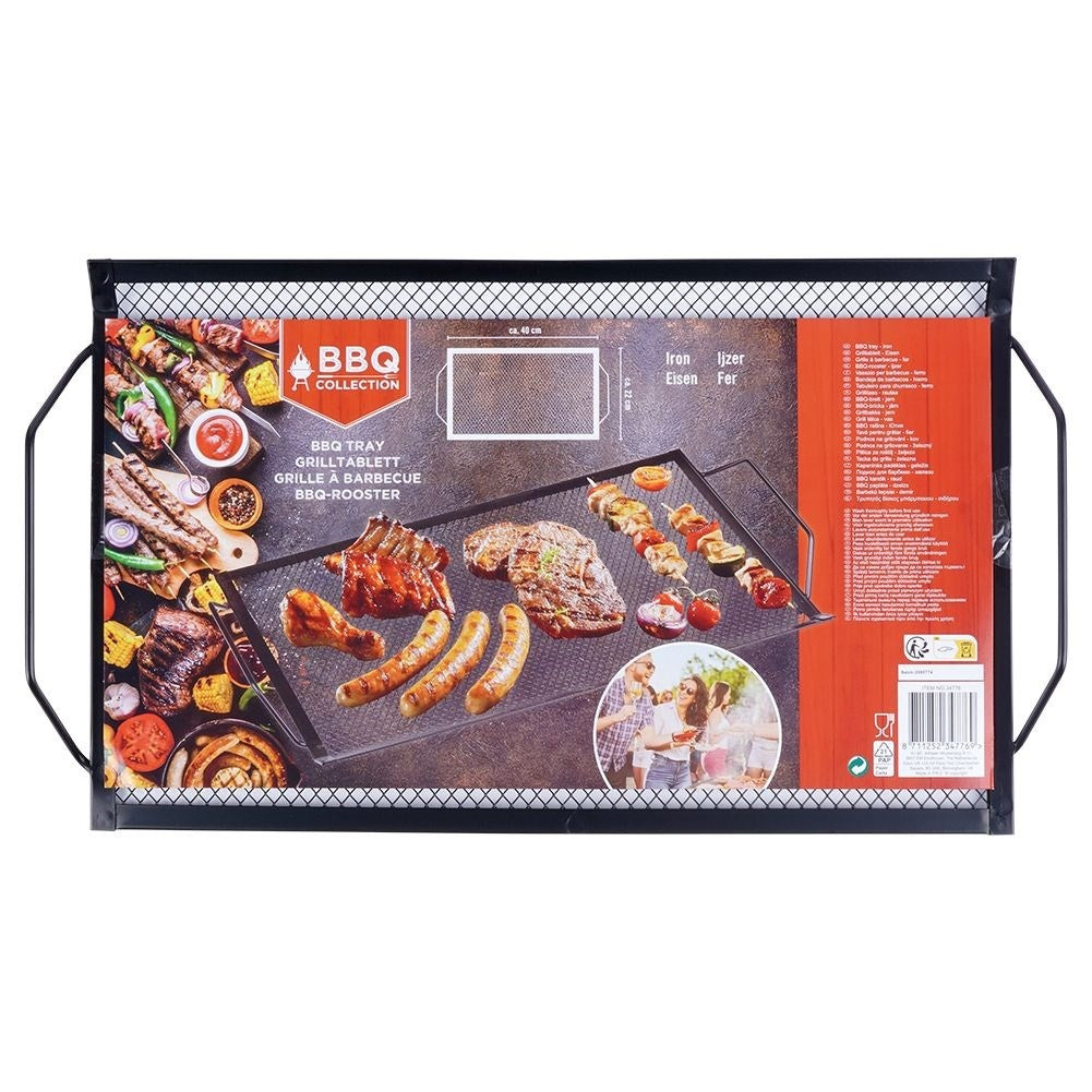 Perforated grill plate in black metal for meat and vegetables