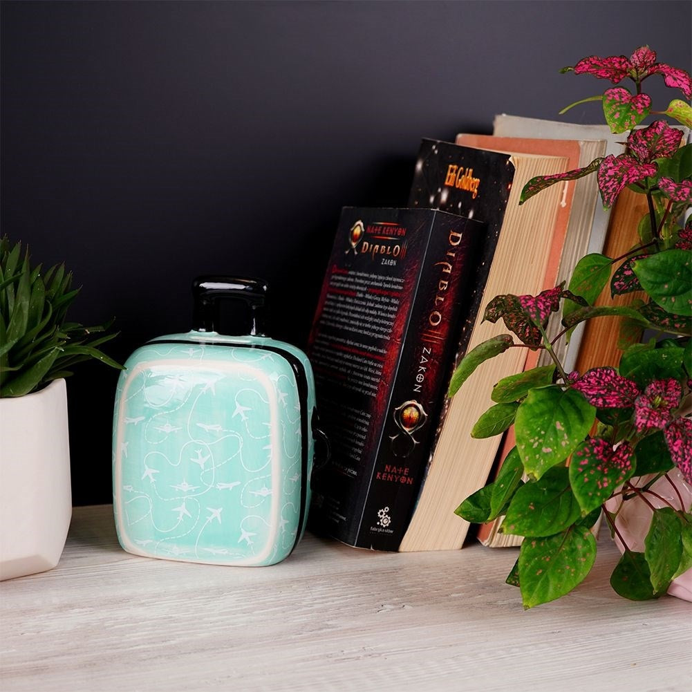 Piggy bank in turquoise ceramic - decorative and practical