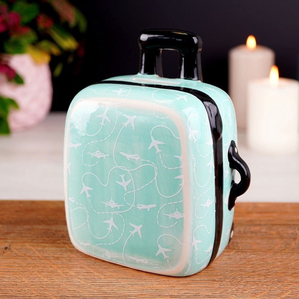 Piggy bank in turquoise ceramic - decorative and practical