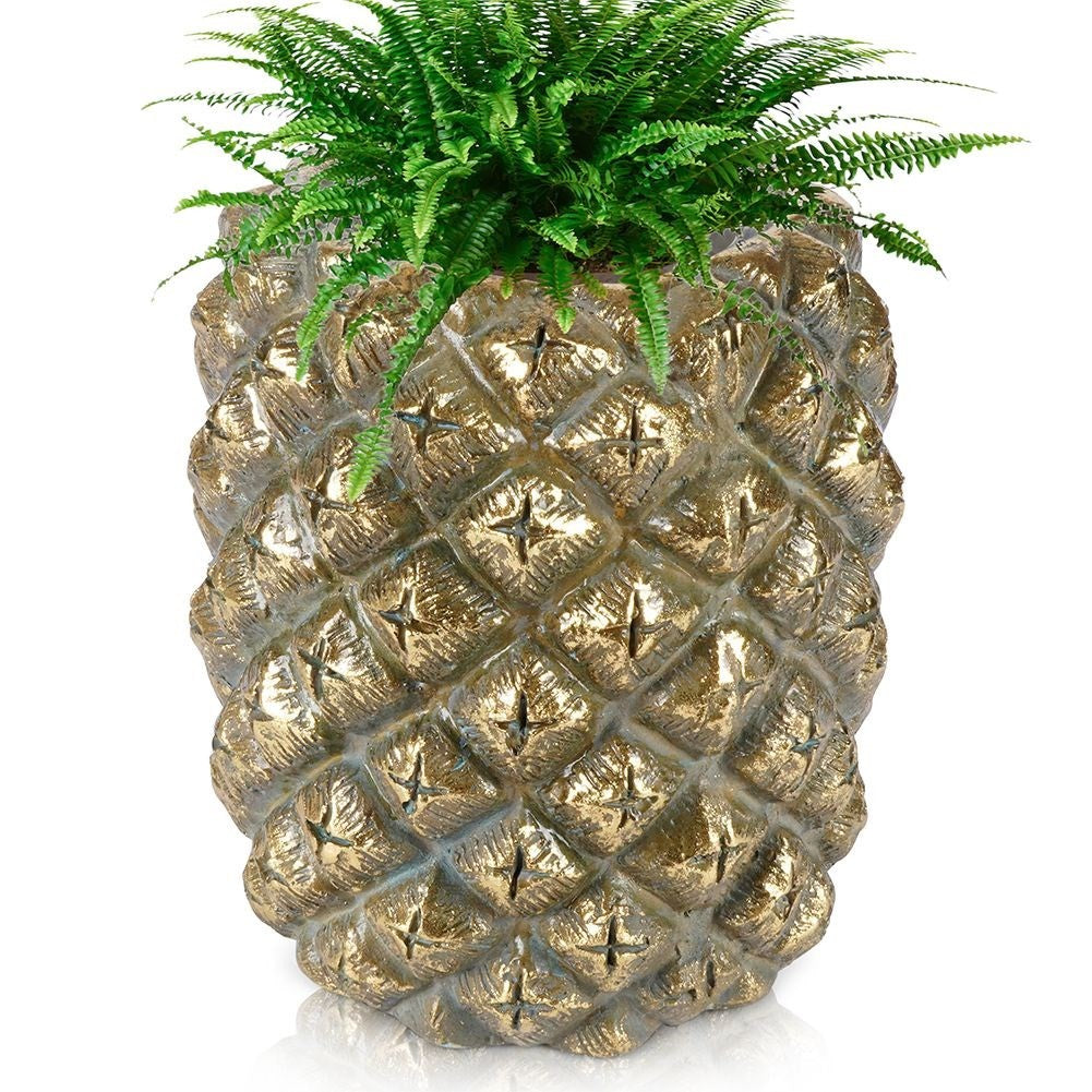 Pineapple-shaped pot in gold for exclusive interior design