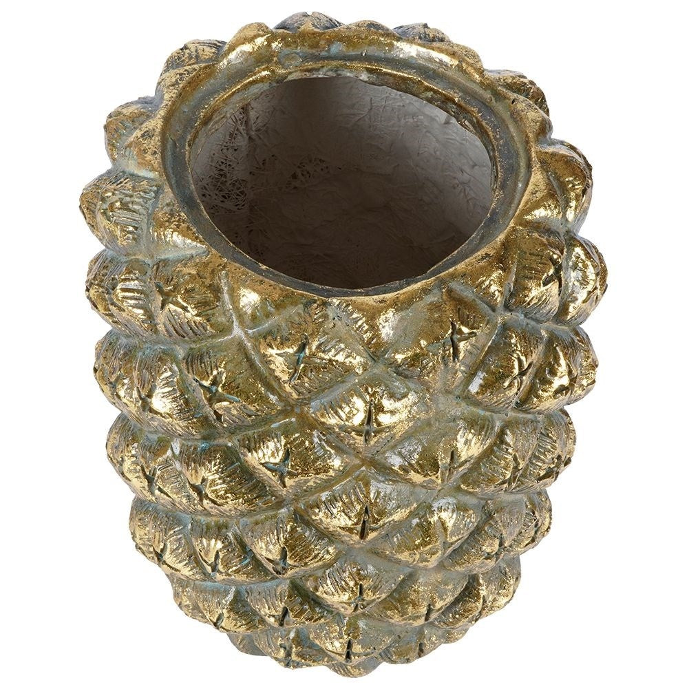 Pineapple-shaped pot in gold for exclusive interior design