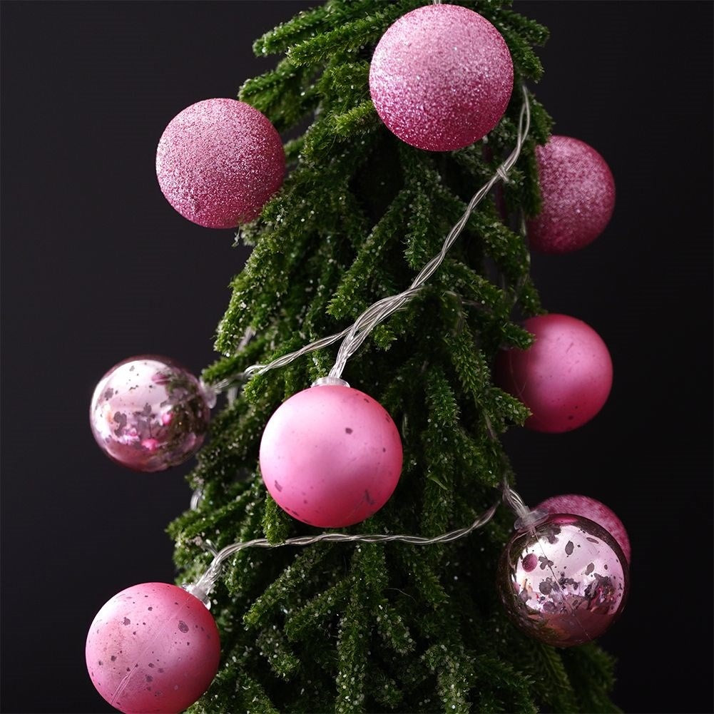 Pink glowing Christmas tree balls: matte, glittery, shiny, LED
