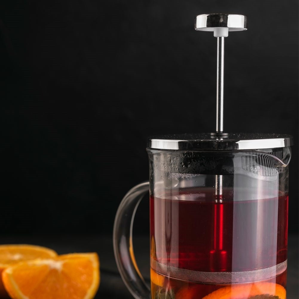 Pitcher-shaped glass brewer with strainer for coffee, tea and milk frothing