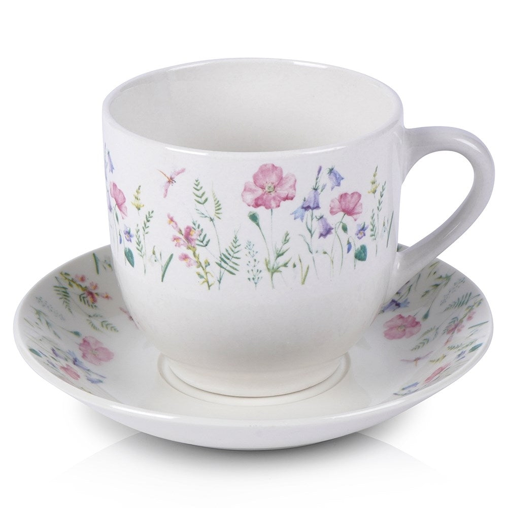 Porcelain cup with floral pattern and saucer