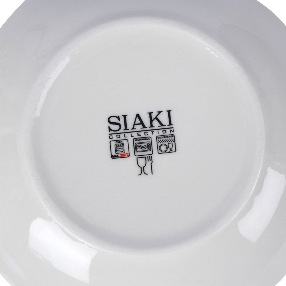 Porcelain cup with floral pattern and saucer