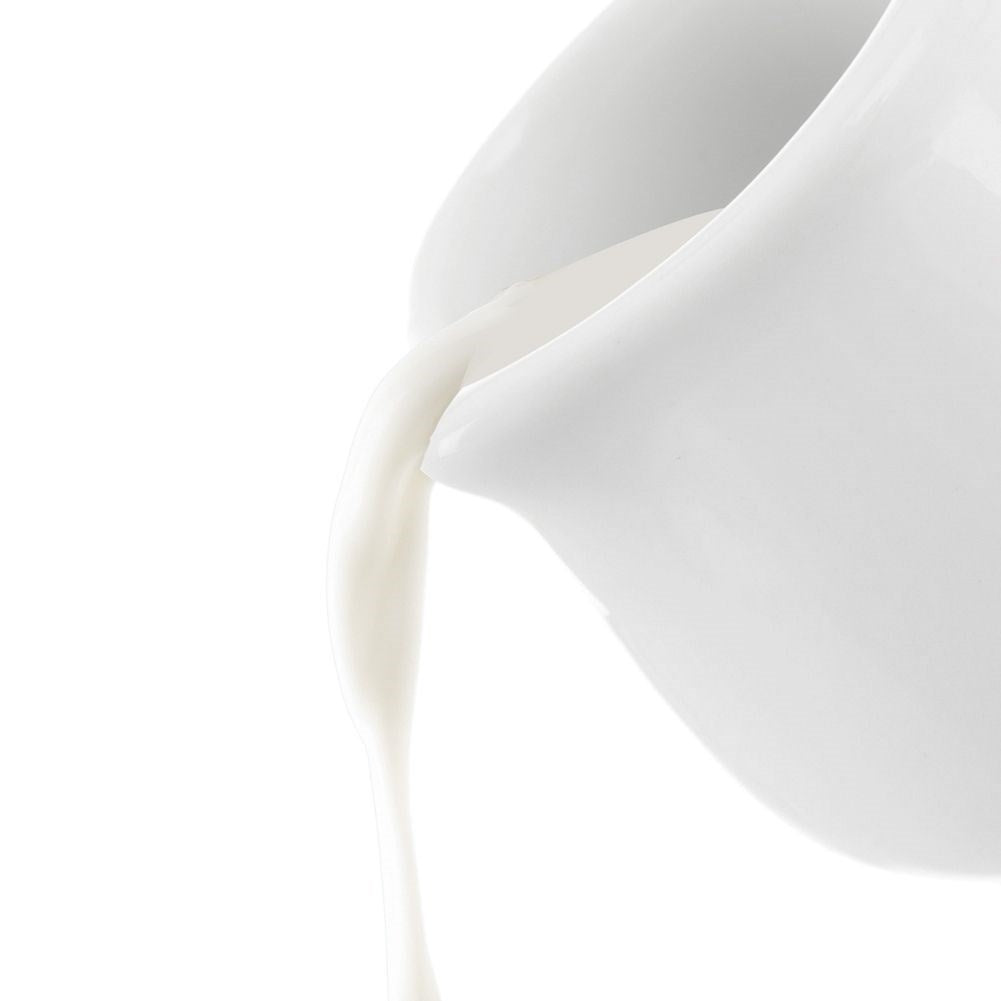Porcelain jug with practical spout for cream or milk