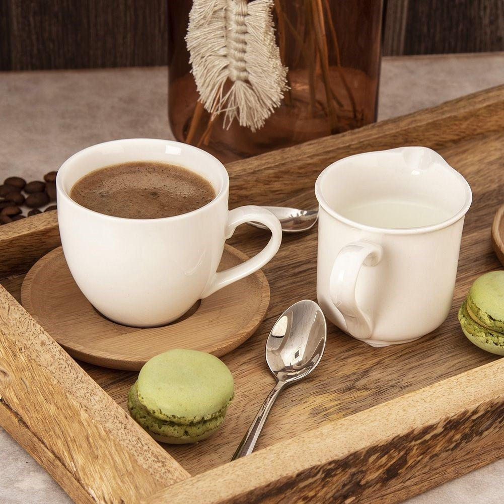 Porcelain milk jug with practical spout and handle